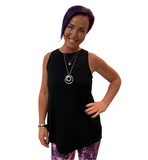 WOMAN WEARING BLACK TANK TOP WITH CAPRIS
