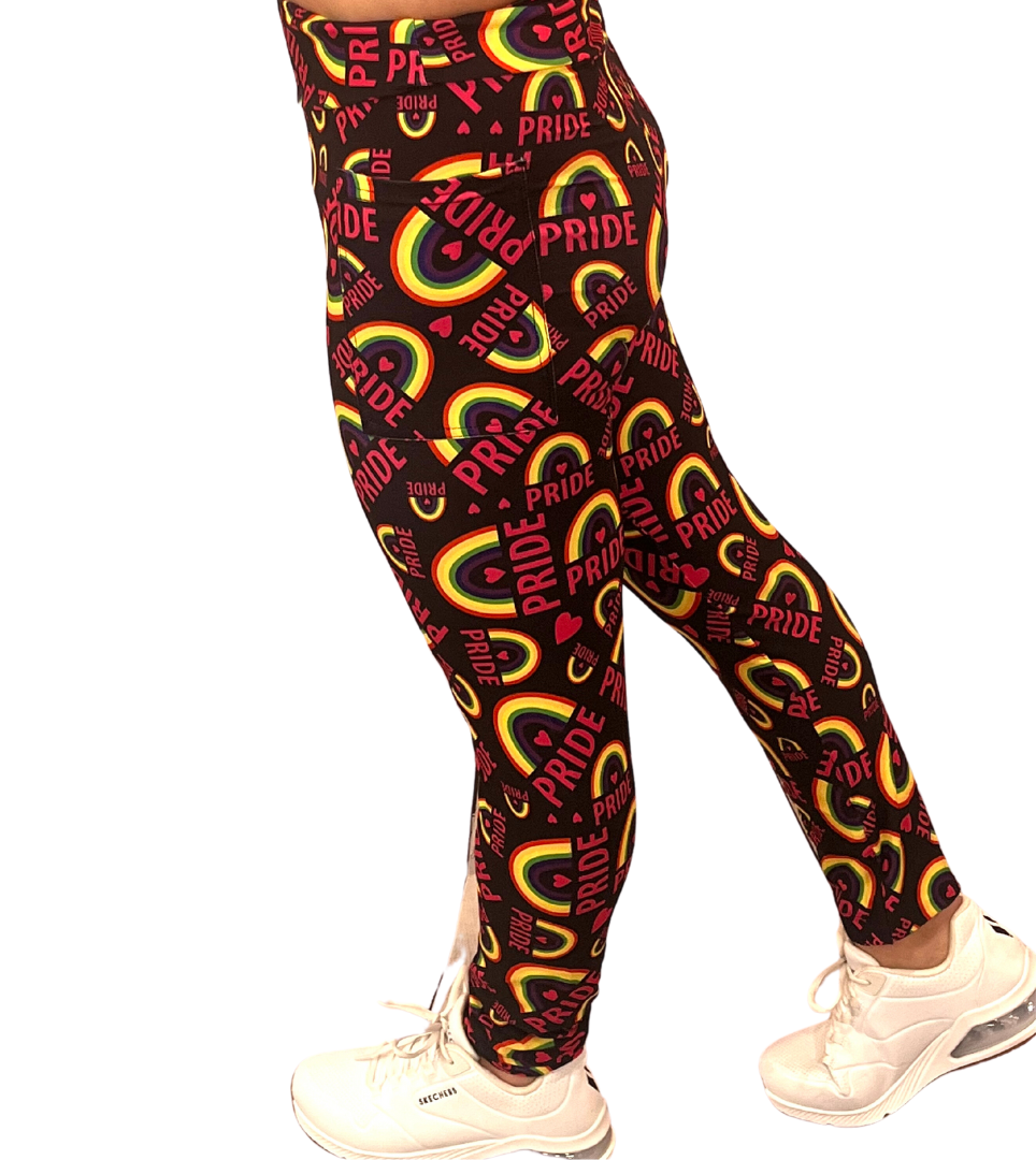 WOMAN WEARING RAINBOW PRIDE LEGGINGS