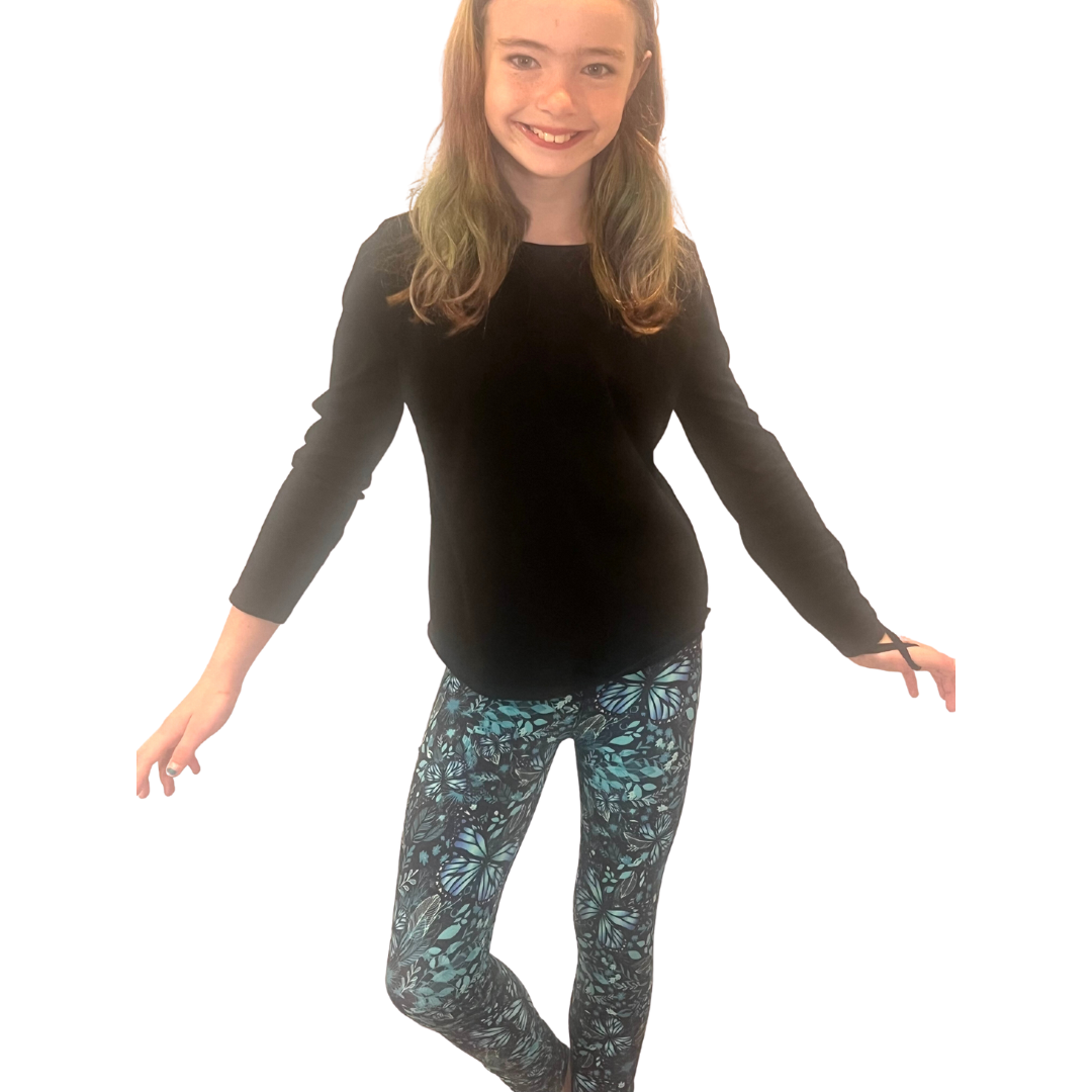 TODDLER WEARING BUTTERFLY LEGGINGS