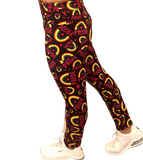 WOMAN WEARING CURVY PRIDE LEGGINGS