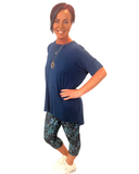 WOMAN WEARING ONE SIZE BUTTERFLY CAPRIS