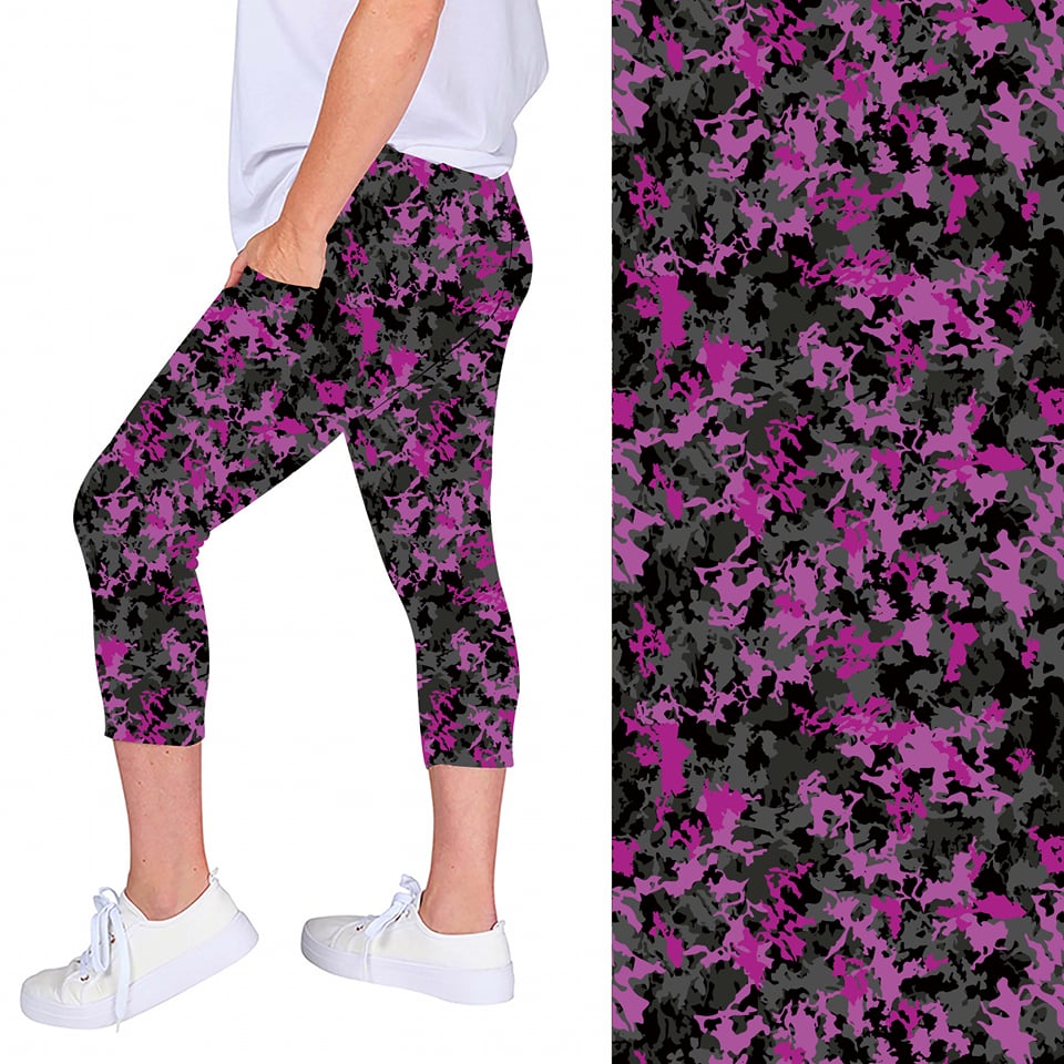 WOMAN WEARING ONE SIZE BLACK AND PURPLE LEGGING CAPRIS
