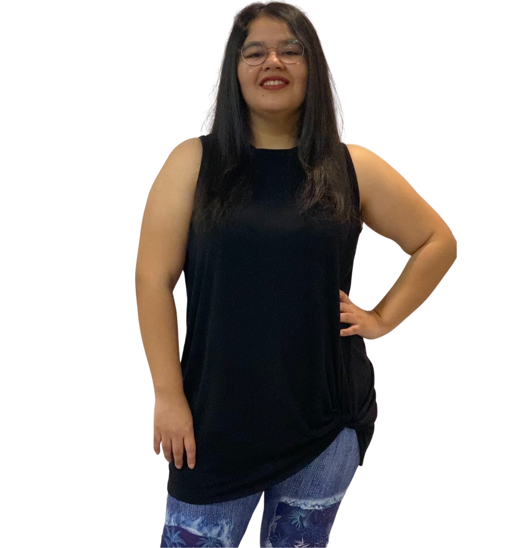 WOMAN WEARING PLUS SIZE BLACK TANK TOP AND LEGGINGS