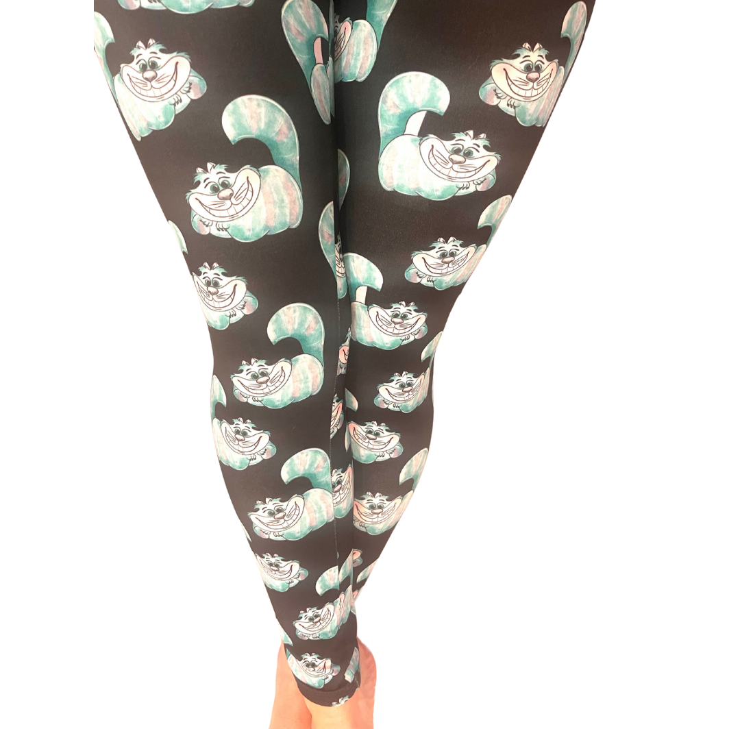 WOMAN WEARING EXTRA PLUS CHESHIRE CAT LEGGINGS