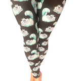 WOMAN WEARING EXTRA PLUS CHESHIRE CAT LEGGINGS