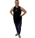 WOMAN WEARING EXTRA PLUS GALAXY LEGGINGS