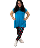 WOMAN WEARING PLUS SIZE COWGIRL LEGGINGS