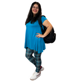 WOMAN WEARING EXTRA CURVY TEAL PLAID LEGGINGS