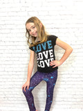 Girl wearing toddler galaxy leggings