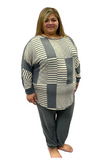 Woman wearing plus size gray jogging pants