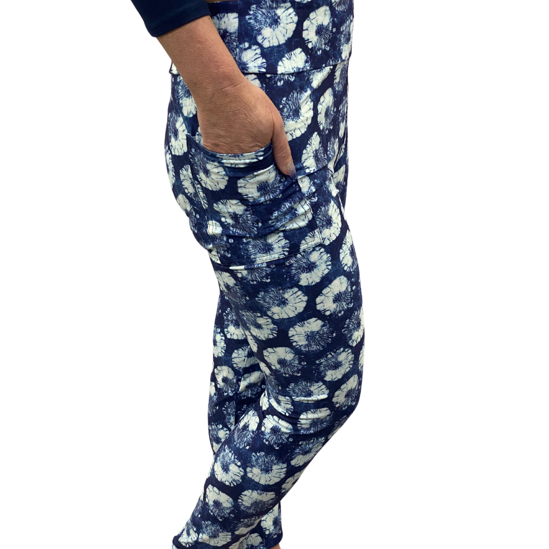 Woman wearing navy and white leggings