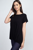 WOMAN WEARING A BLACK SHORT SLEEVE TUNIC WITH LEGGINGS