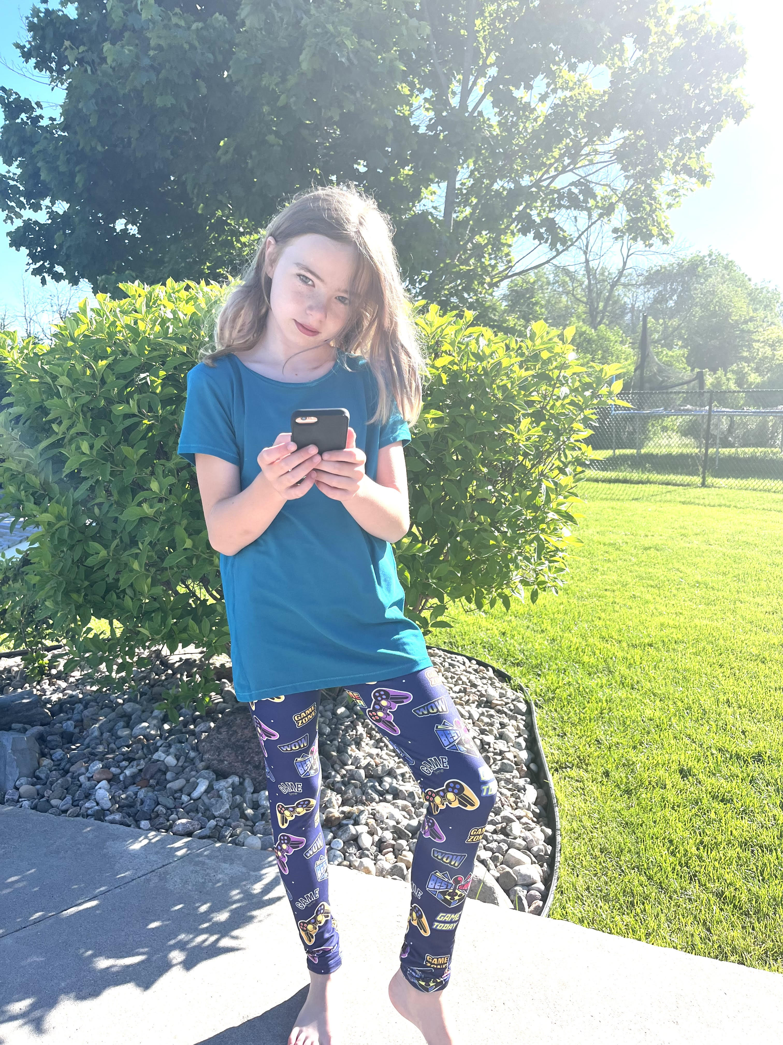 Child wearing gamer leggings