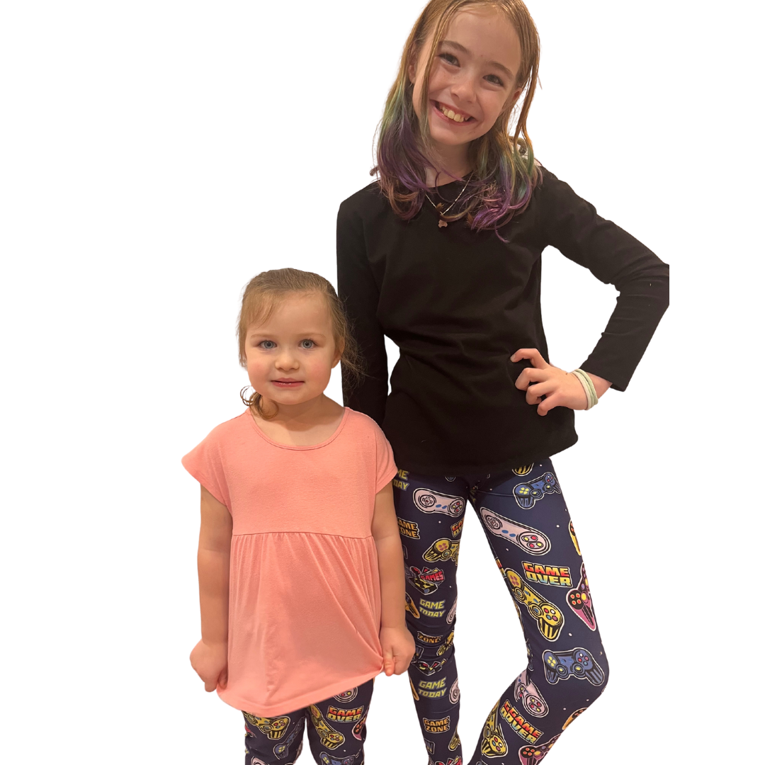 Toddler wearing nintendo leggings