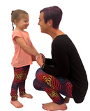 Mom and toddler wearing matching leggings