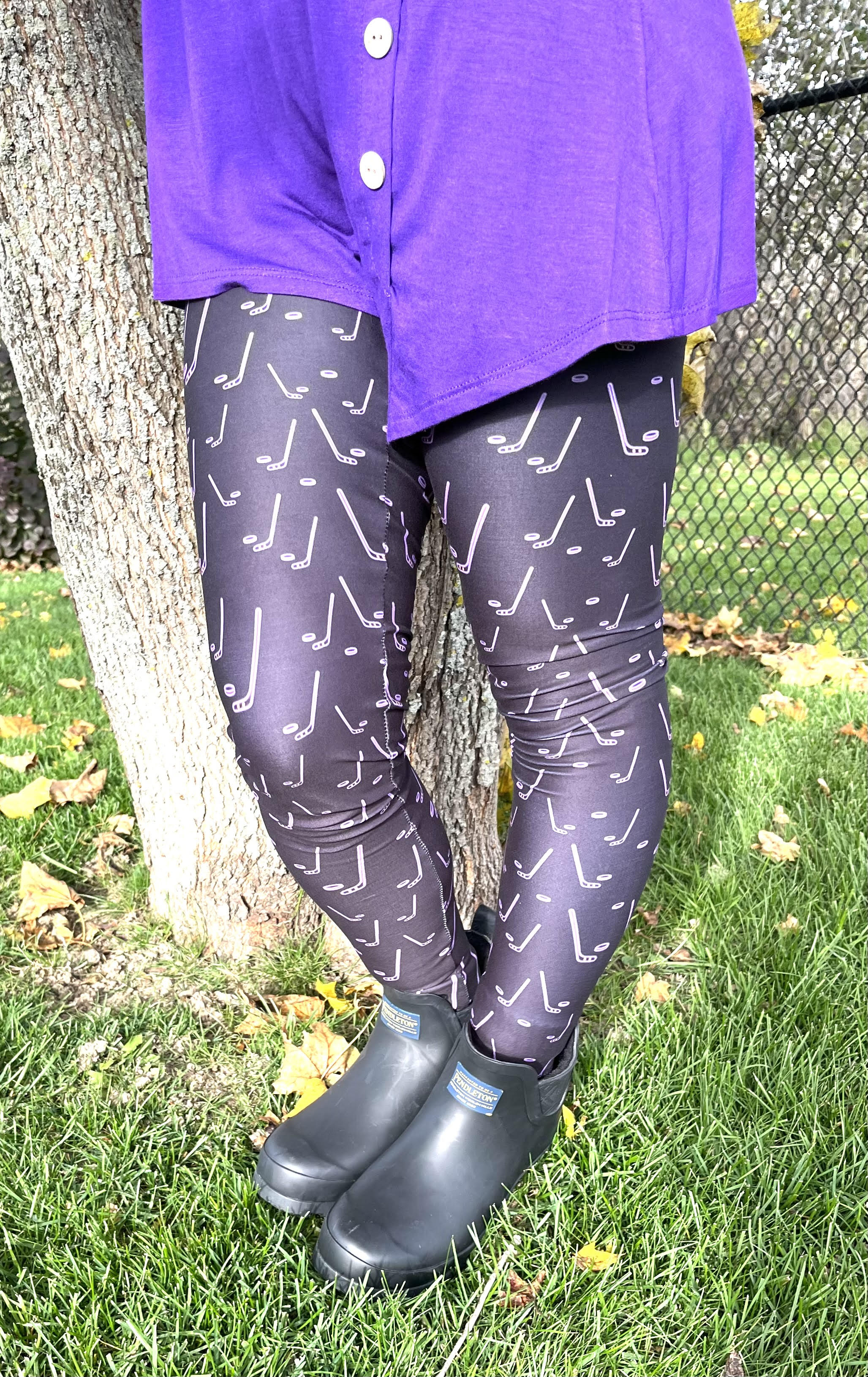 Woman wearing extra plus hockey leggings