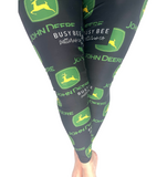 Woman wearing one size John Deere leggings