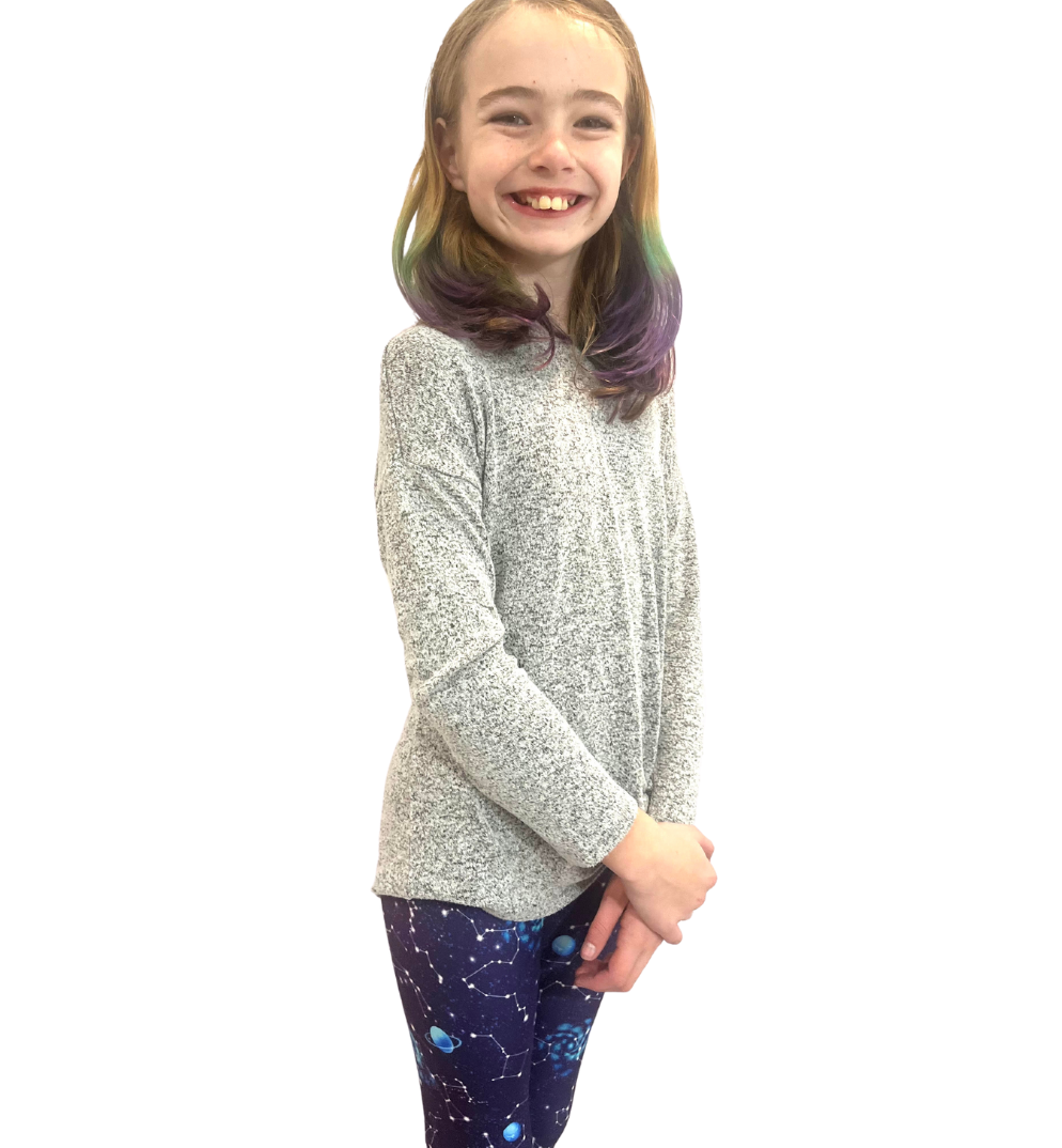 TODDLER WEARING GALAXY LEGGINGS