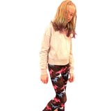 GIRL WEARING HORSE LEGGINGS