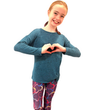 CHILD WEARING VALENTINES LEGGINGS