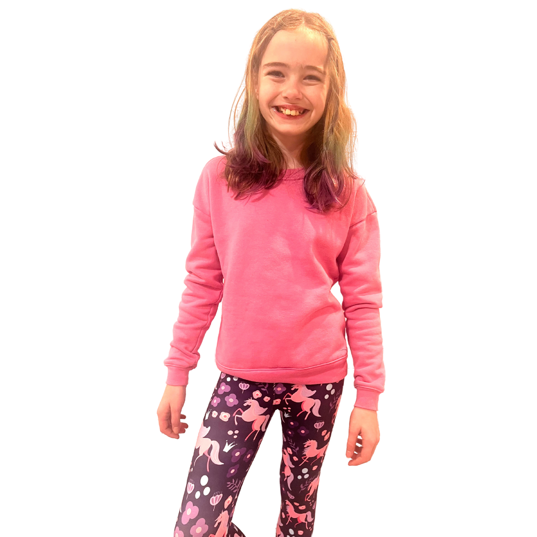 TWEEN WEARING UNICORN LEGGINGS