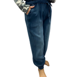 Woman wearing dark blue jean joggers