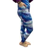 Woman wearing blue and purple leggings with pockets