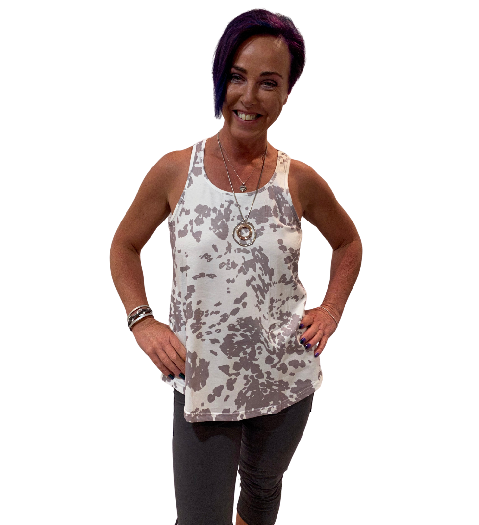 WOMAN WEARING WHITE RACER-BACK TANK