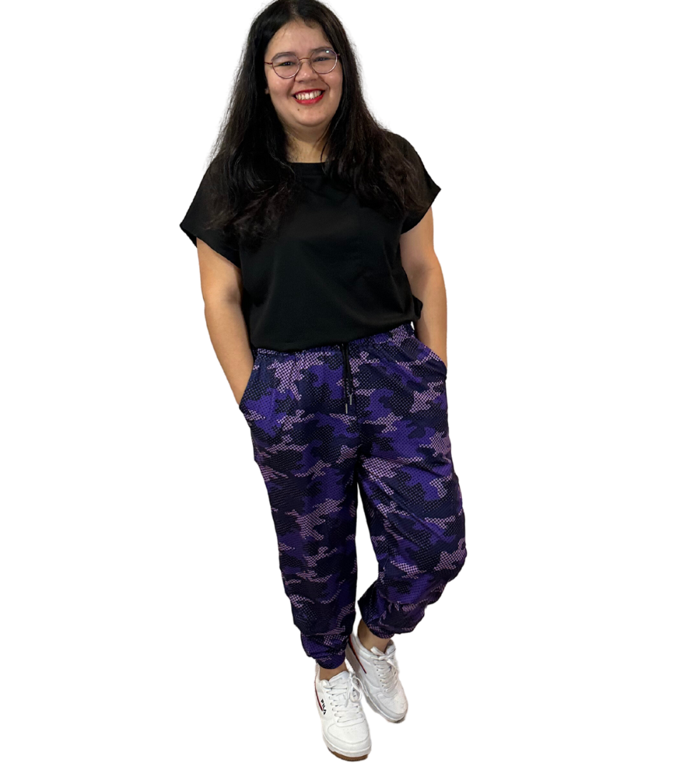 WOMAN WEARING PLUS SIZE PURPLE CAMO JOGGERS