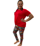 WOMAN WEARING ROCK BAND LEGGINGS