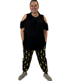 WOMAN WEARING PLUS SIZE TWEETY JOGGING PANTS