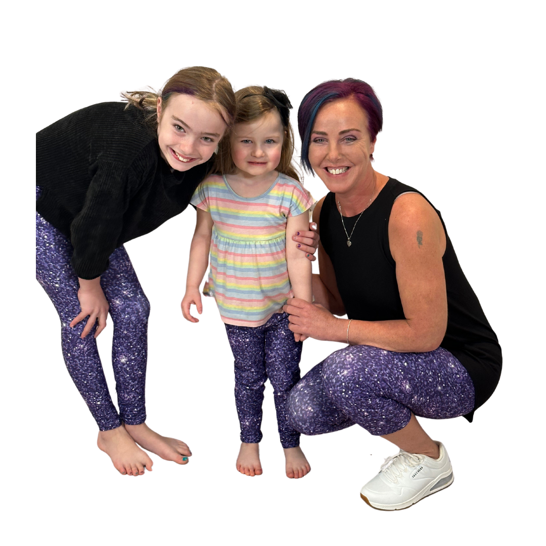 FAMILY WEARING MATCHING LEGGINGS