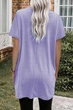 WOMAN WEARING PURPLE T-SHIRT DRESS WITH POCKETS