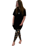 Woman wearing extra plus gnome leggings