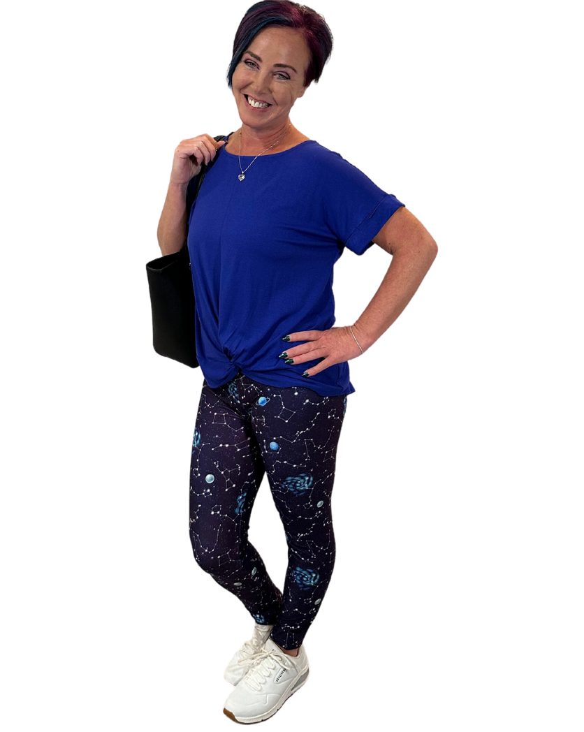 WOMAN WEARING GALAXY YOGA LEGGINGS
