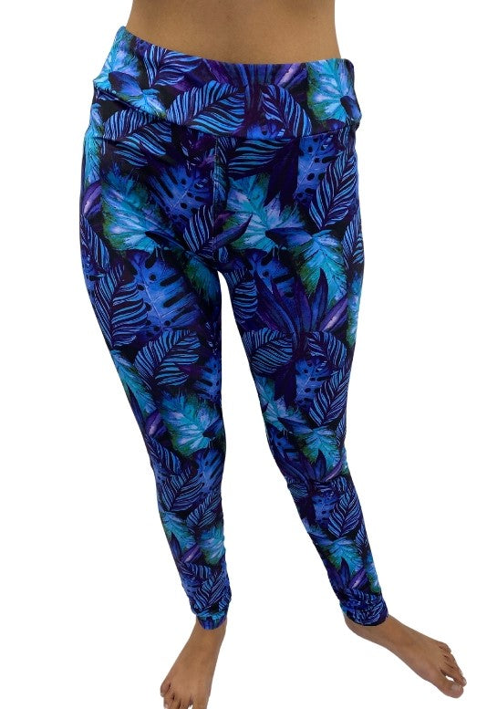Woman wearing curvy tropical leggings