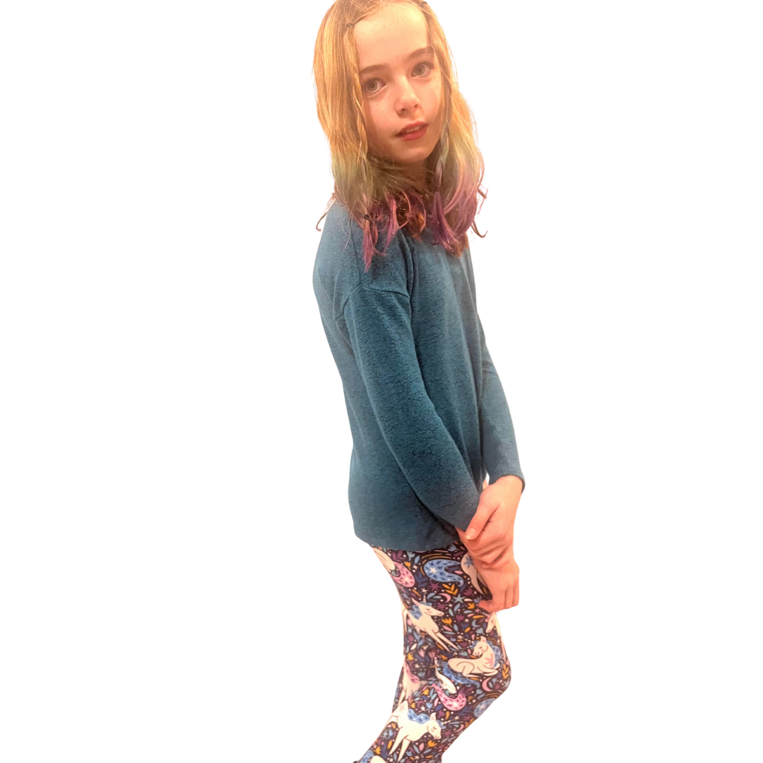 TWEEN WEARING UNICORN LEGGINGS