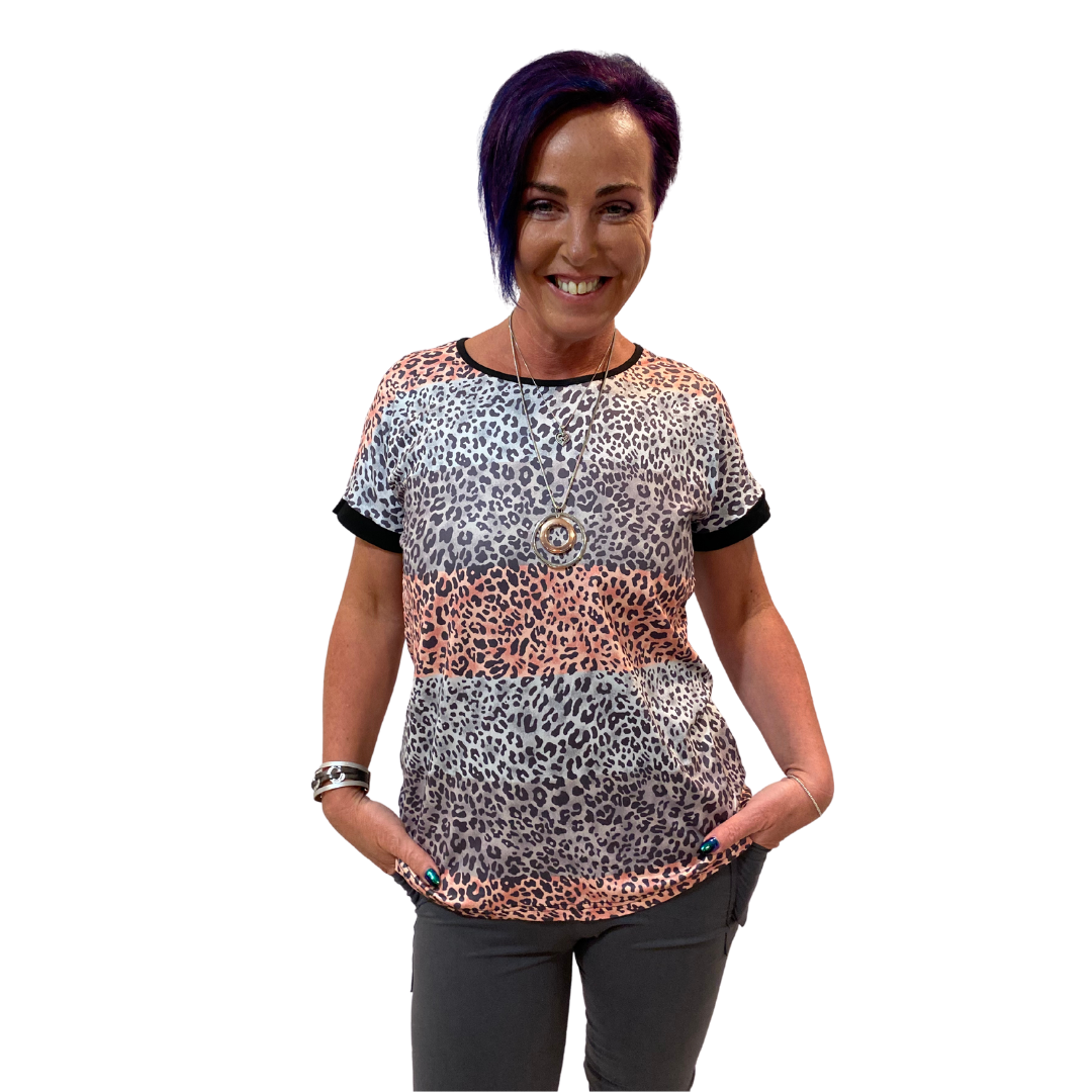 WOMAN WEARING GRAY AND PINK SHIRT