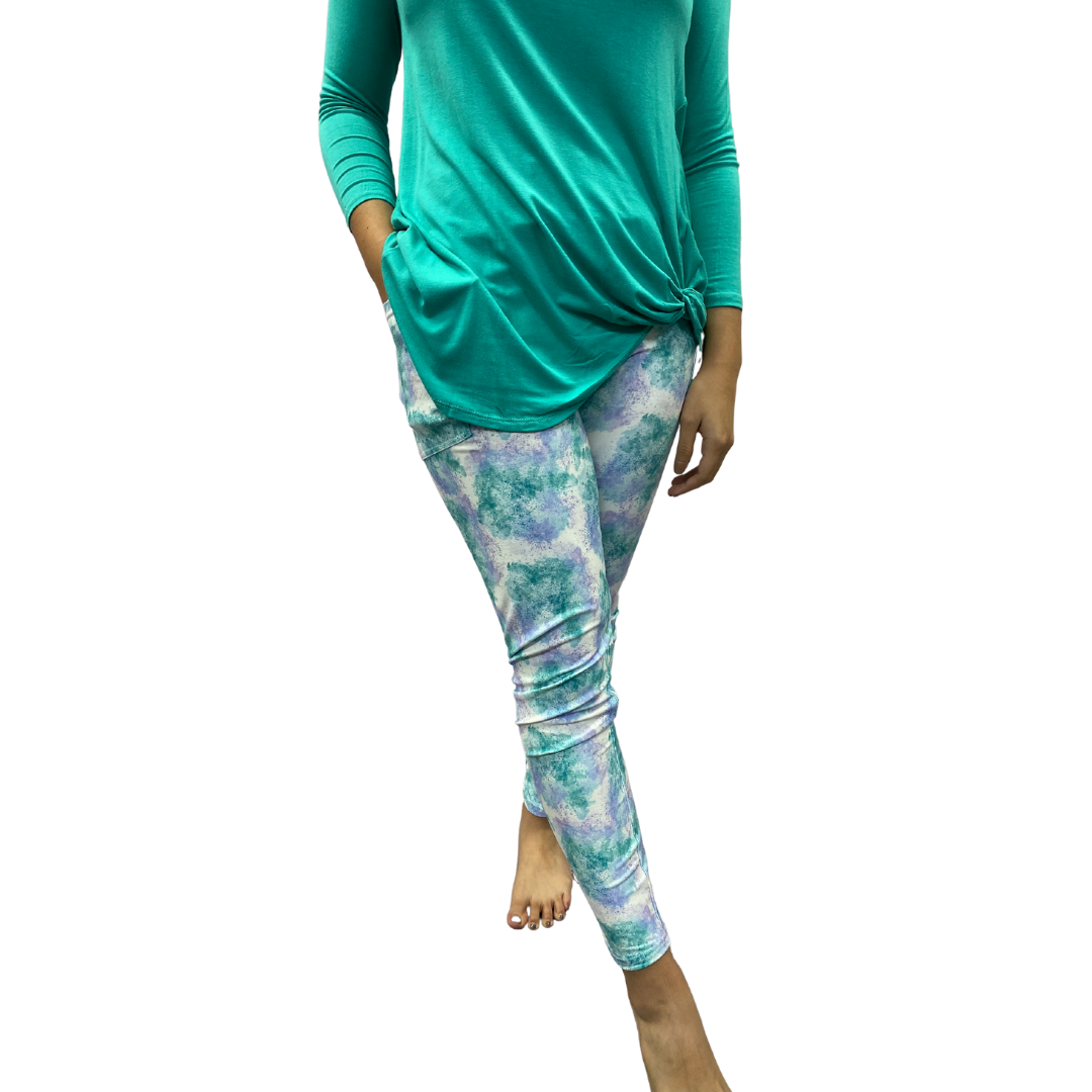 Woman wearing tie-dye leggings with pockets