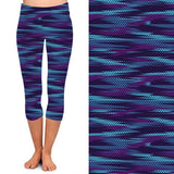 WOMAN WEARING ONE SIZE BLUE AND PURPLE LEGGING CAPRIS