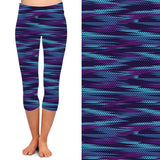 WOMAN WEARING EXTRA CURVY BLUE AND PURPLE LEGGING CAPRIS