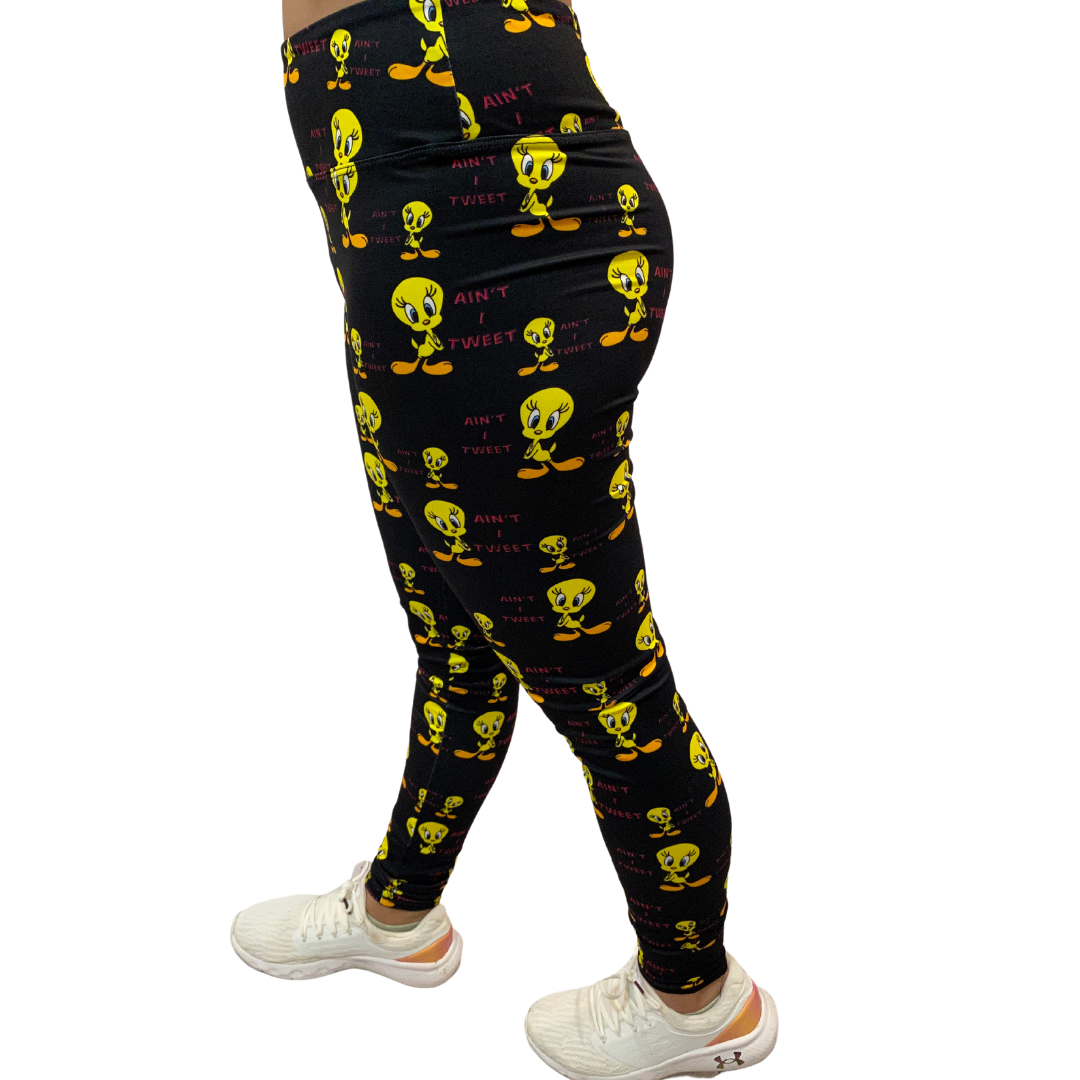 WOMAN WEARING TWEETY LEGGINGS