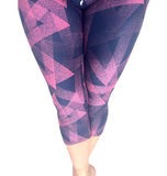 WOMAN WEARING REGULAR PINK AND BLACK LEGGING CAPRIS