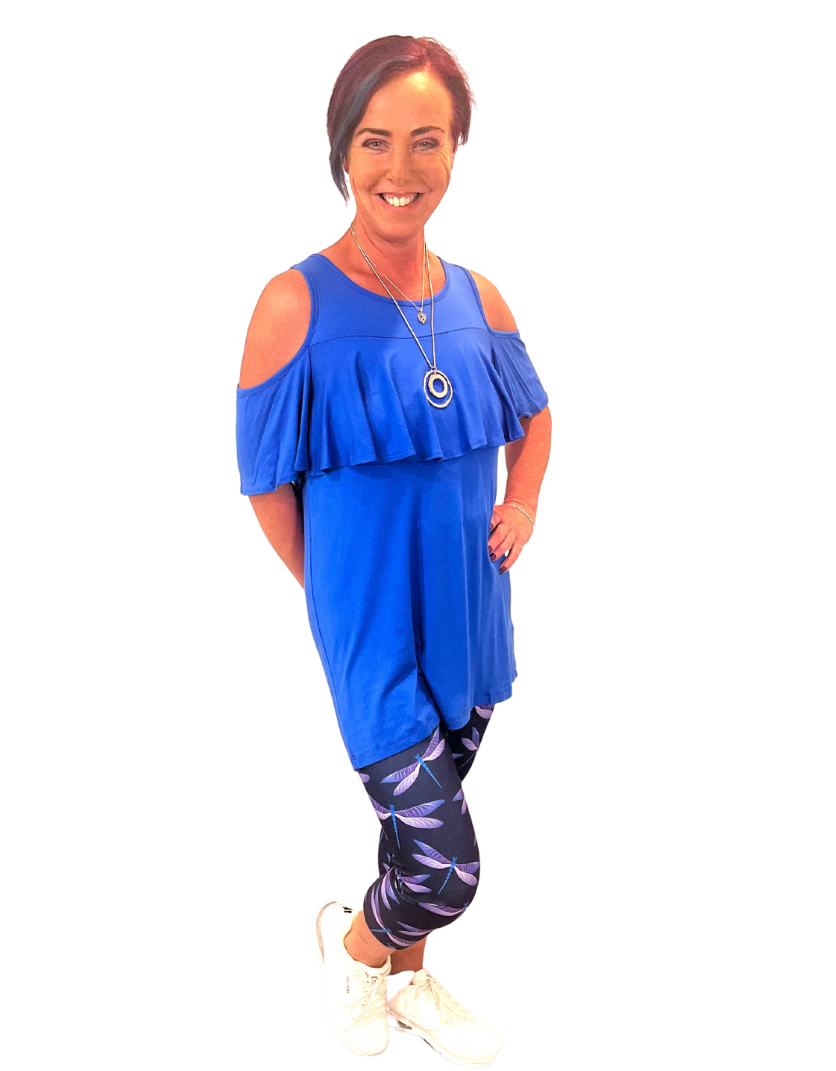 WOMAN WEARING EXTRA PLUS DRAGONFLY CAPRIS