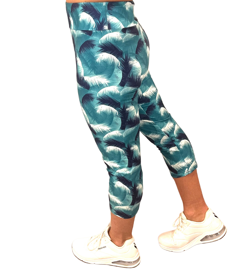 WOMAN WEARING CURVY TEAL AND NAVY CAPRIS