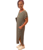 WOMAN WEARING A STRIPED MAXI DRESS