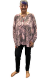 Woman wearing plus size black jeggings with pockets