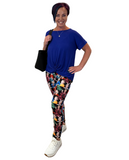 WOMAN WEARING GOLDEN GIRL LEGGINGS