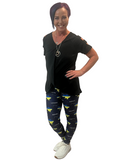 WOMAN WEARING BLACK CUTOUT SHOULDER SHIRT