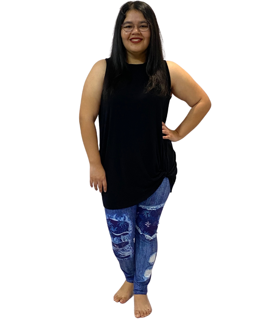 WOMAN WEARING PLUS SIZE BLACK TANK TOP WITH SIDE KNOT
